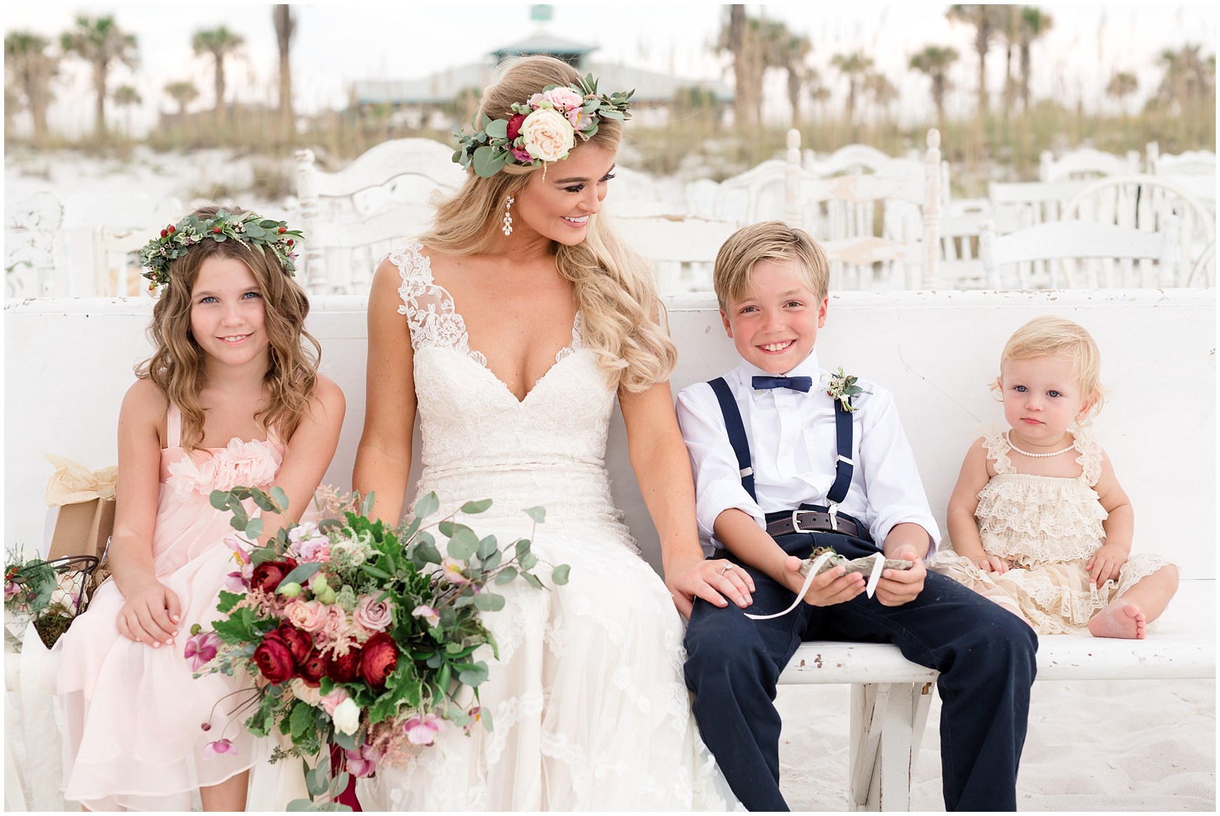 Bride with flower girls and ring bearer